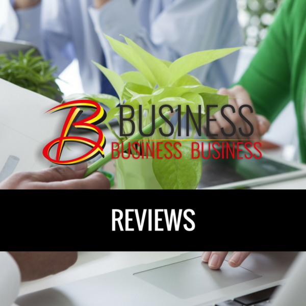 A group of people sitting at a table with the words "Be Reviewed" business reviews.