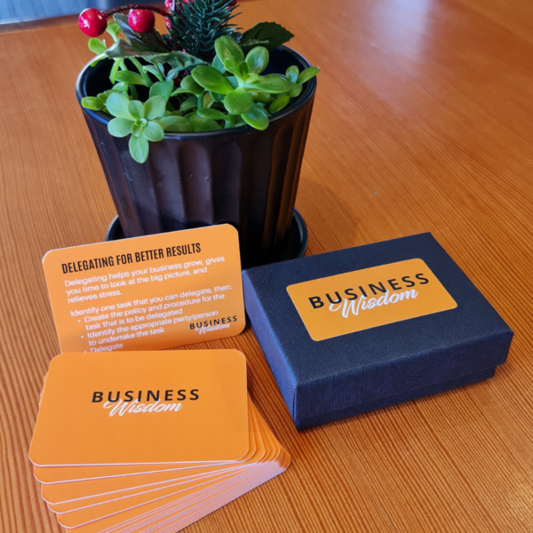 Business Wisdom Deck on table.