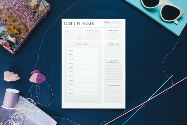 Time Blocking Planning Sheets on a blue background designed with a time blocking template.