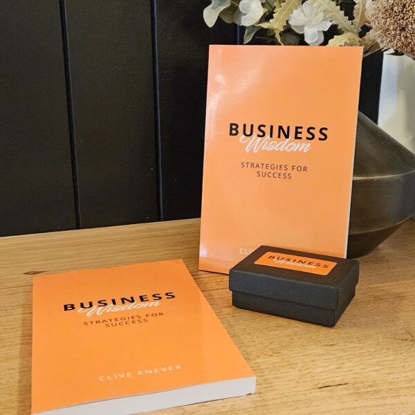 Business Wisdom: Strategies for Success and a vase on a table.